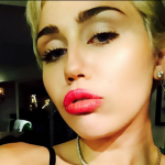 Miley Cyrus Denies Implants Rumor